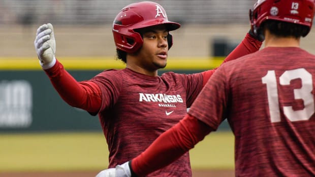 Kendall Diggs coming home after homer in first inning of scrimmage